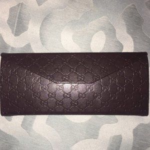 Gucci sunglasses case that folds